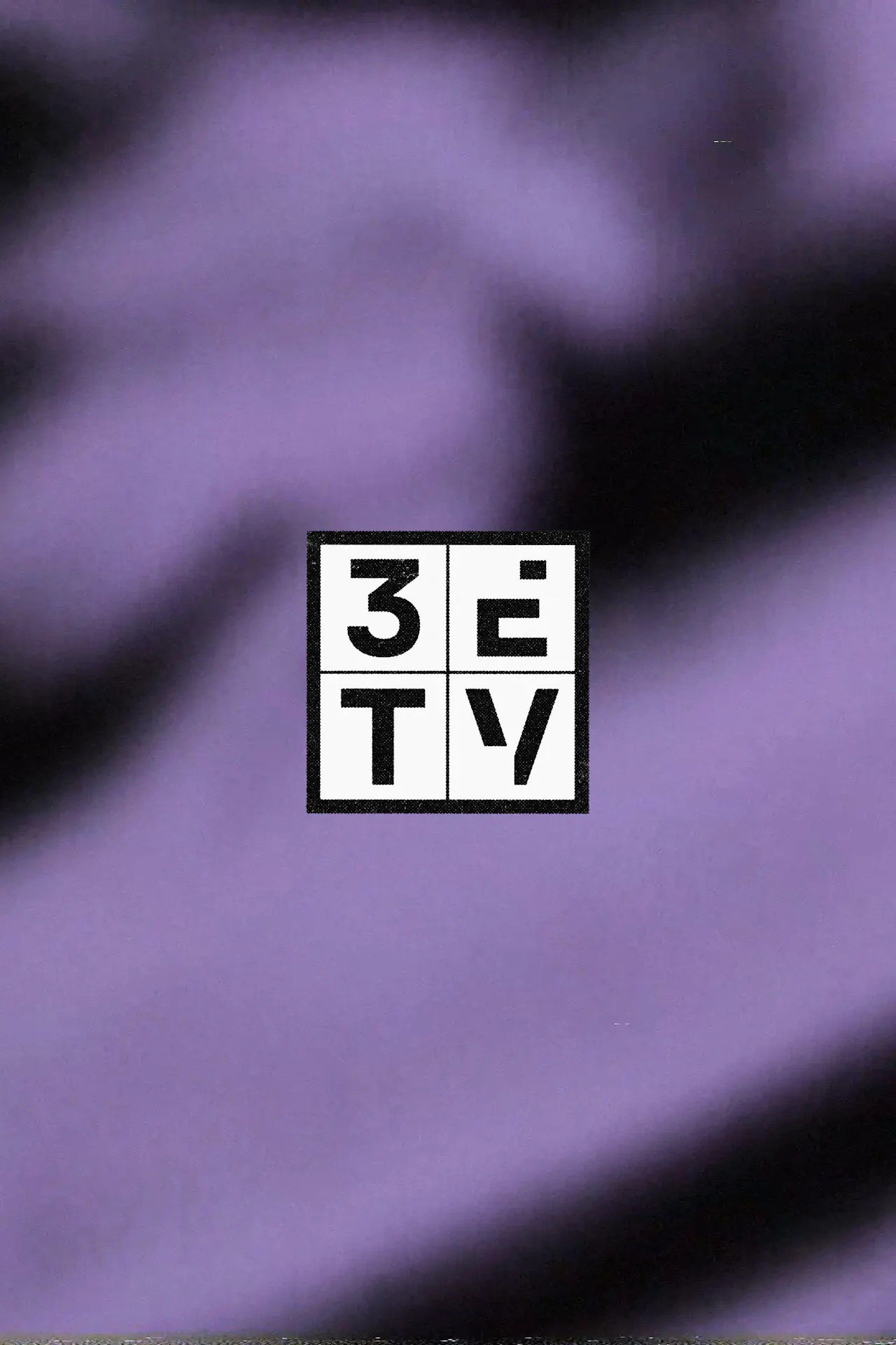 The 3ETV logo – a black-and-white square grid of letters – on a blurred purple and black background.